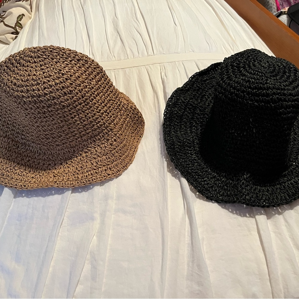 2 straw hats. Black and natural color.